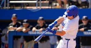 University of Florida catcher Nathan Hickey gets a hit as the Florida Gators beat Troy to complete a series sweep- Florida Gators baseball- 1280x853