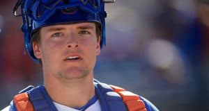 University of Florida catcher Nathan Hickey walks off the field after the Florida Gators 7-3 win over Troy- Florida Gators baseball- 1280x853