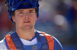 University of Florida catcher Nathan Hickey walks off the field after the Florida Gators 7-3 win over Troy- Florida Gators baseball- 1280x853