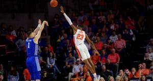 University of Florida freshman Scottie Lewis goes up for a block in a loss to the Kentucky Wildcats- Florida Gators basketball- 1820x853