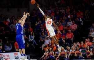 University of Florida freshman Scottie Lewis goes up for a block in a loss to the Kentucky Wildcats- Florida Gators basketball- 1820x853