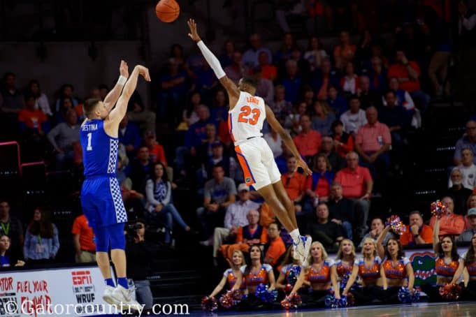University of Florida freshman Scottie Lewis goes up for a block in a loss to the Kentucky Wildcats- Florida Gators basketball- 1820x853