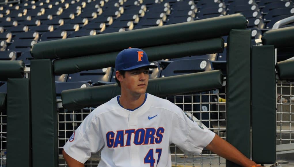 University of Florida pitcher Tommy Mace relaxes before the Florida Gators game against Texas Tech in the 2018 College World Series- Florida Gators baseball- 1280x850