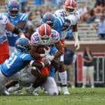Malik Davis breaks a tackle against Ole Miss- 1186x820