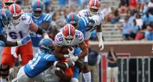 Malik Davis breaks a tackle against Ole Miss- 1186x820