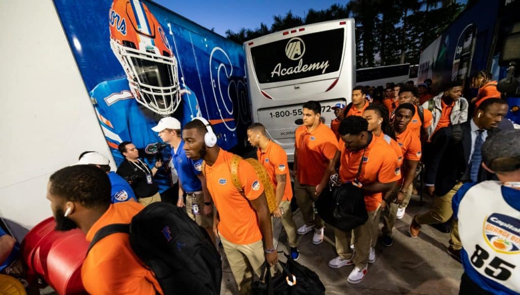 The Florida Gators get off the bus and enter Hard Rock Stadium before their Orange Bowl matchup against Virginia- Florida Gators football- 1280x853