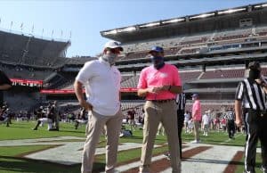 Dan Mullen talks with Jimbo Fisher before the A&M game- 942x700