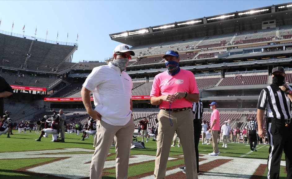 Dan Mullen talks with Jimbo Fisher before the A&M game- 942x700