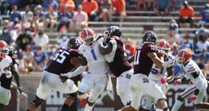 Defensive end Brenton Cox rushes Kellen Mond. - 1149x800