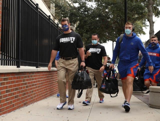 Kyle Trask and Nick Savage enter the stadium before the South Carolina game