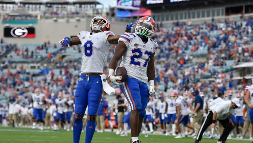 Dameon Pierce celebrates with Trevon Grimes-1121x780