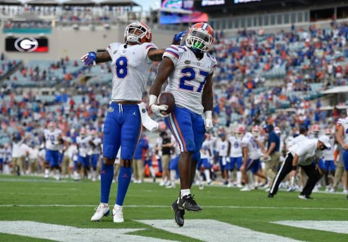 Dameon Pierce celebrates with Trevon Grimes-1121x780