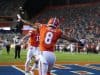 Receiver Trevon Grimes celebrates with Kyle Trask-1158x800