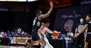 Guard Noah Locke drives against Army-1200x800