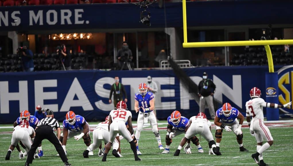 Quarterback Kyle Trask throws against Alabama-1150x767