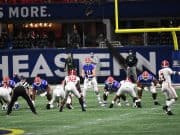 Quarterback Kyle Trask throws against Alabama-1150x767