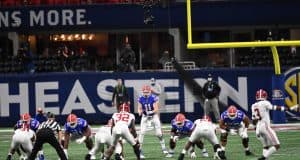 Quarterback Kyle Trask throws against Alabama-1150x767