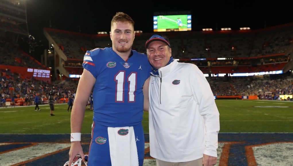 Quarterback Kyle Trask with head coach Dan Mullen during senior night-1200x897