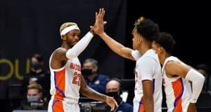 Scottie Lewis celebrates with Tre Mann against Army-1200x800