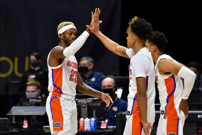 Scottie Lewis celebrates with Tre Mann against Army-1200x800