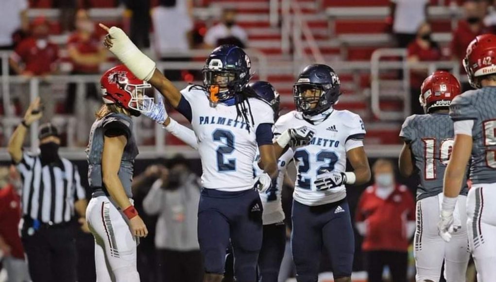 Corey Collier plays in a cast for Palmetto High School - 1280x852