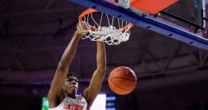 Omar Payne throws down a dunk against Kentucky in 2020 - 1280x854