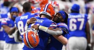 Quarterbacks Emory Jones and Kyle Trask hug during the Cotton Bowl - 1280x853