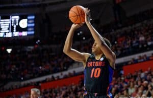 Noah Locke shoots a three-pointer against Auburn in 2020 - 1280x853