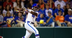 Florida Gators softball player Charla Echols fouls off a pitch -1280x854