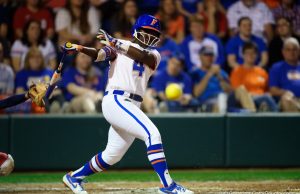 Florida Gators softball player Charla Echols fouls off a pitch -1280x854