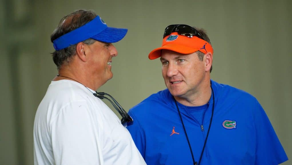 Dan Mullen and Todd Grantham have a discussion ahead of spring practice - 1280x854