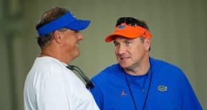 Dan Mullen and Todd Grantham have a discussion ahead of spring practice - 1280x854