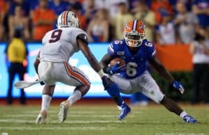 Florida Gators running back Nay'Quan Wright evades a tackle against Auburn - 1280x854