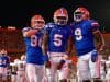 Trent Whittemore, Emory Jones and Keon Zipperer celebrate a touchdown against Auburn in 2019 - 1280x854