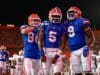 Trent Whittemore, Emory Jones and Keon Zipperer celebrate a touchdown against Auburn in 2019 - 1280x854