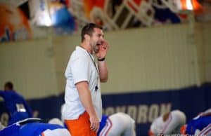 Florida Gators strength coach Nick Savage during team warmups at a 2019 spring practice - 1280x853