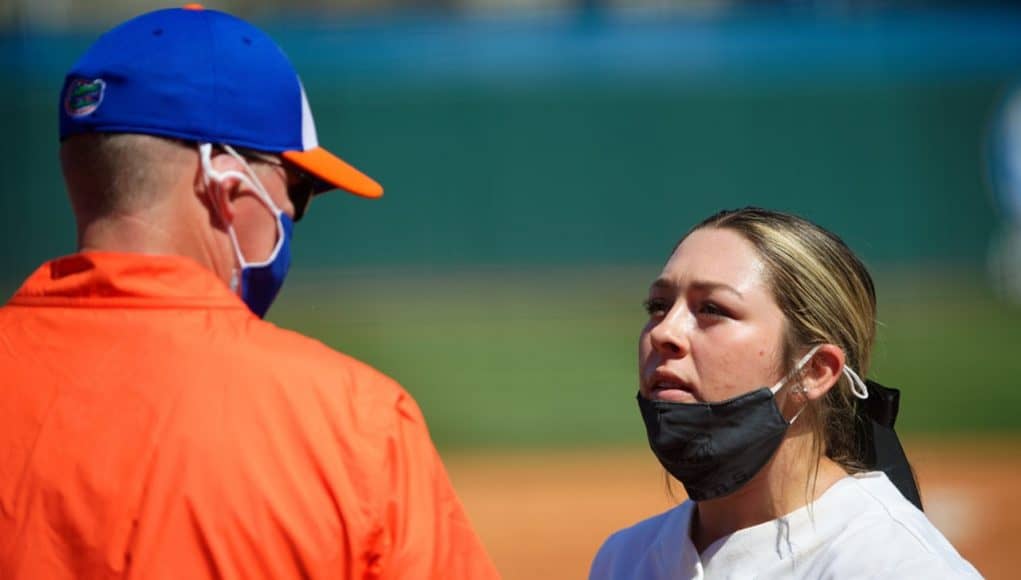 Florida Gators head coach Tim Walton has a chat with pitcher Natalie Lugo in the circle - 1280x854