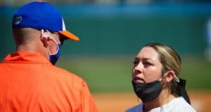 Florida Gators head coach Tim Walton has a chat with pitcher Natalie Lugo in the circle - 1280x854