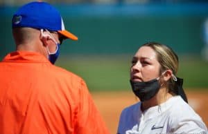 Florida Gators head coach Tim Walton has a chat with pitcher Natalie Lugo in the circle - 1280x854