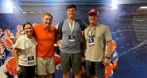 Offensive lineman Preston Cushman with Florida Gators head coach Dan Mullen-1000x776