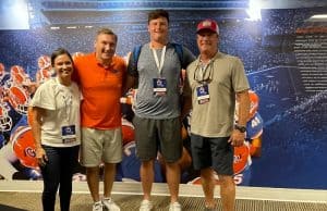 Offensive lineman Preston Cushman with Florida Gators head coach Dan Mullen-1000x776