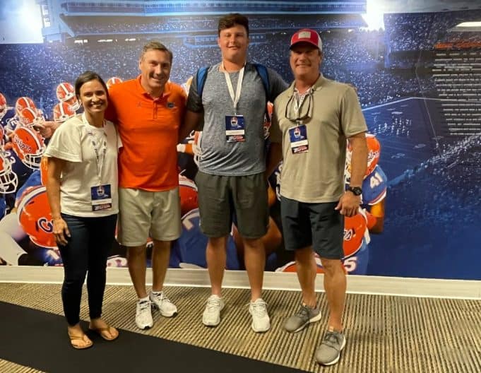 Offensive lineman Preston Cushman with Florida Gators head coach Dan Mullen-1000x776