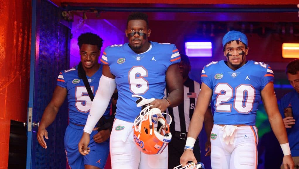 Florida Gators defensive lineman Zachary Carter, running back Malik Davis and Ventrell Miller- 1280x852