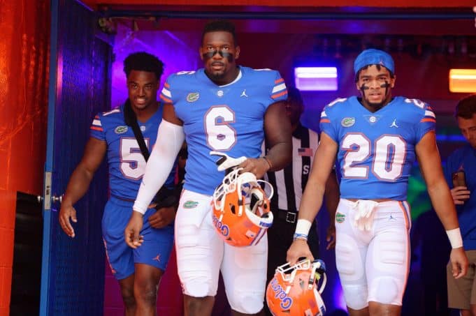 Florida Gators defensive lineman Zachary Carter, running back Malik Davis and Ventrell Miller- 1280x852