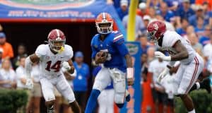 Florida Gators quarterback Emory Jones runs against Alabama in the Swamp-1280x854