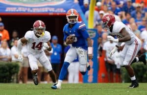 Florida Gators quarterback Emory Jones runs against Alabama in the Swamp-1280x854