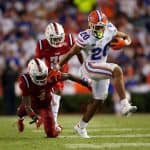 Running back Malik Davis runs against FAU in the season opener- 1280x853