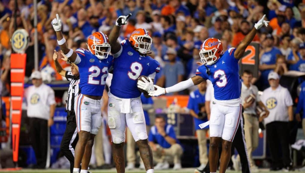 Florida Gators defense celebrates Gervon Dexter's interception.-1280x853