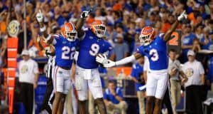 Florida Gators defense celebrates Gervon Dexter's interception.-1280x853