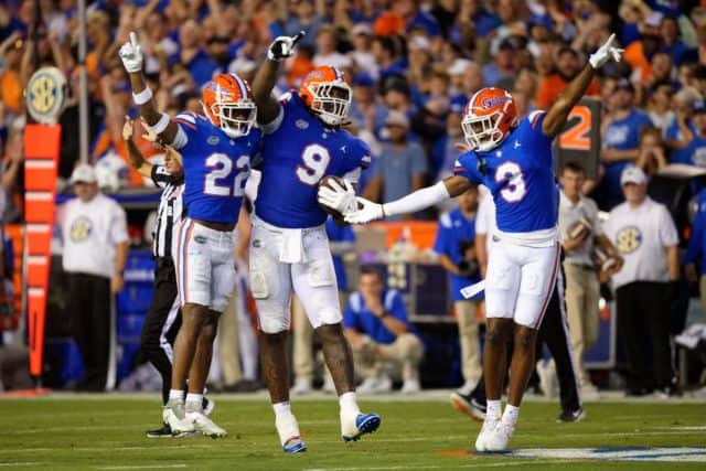 Florida Gators defense celebrates Gervon Dexter's interception.-1280x853